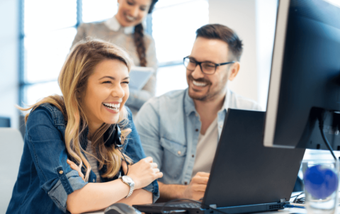 Group of business people and software developers working as a team in office