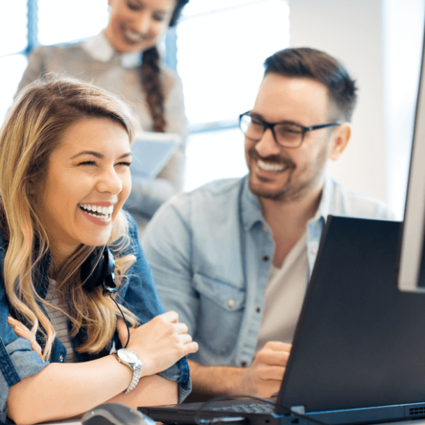 Group of business people and software developers working as a team in office