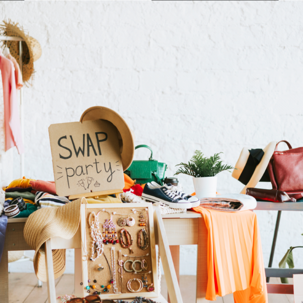 Clothing on table for a clothes swap