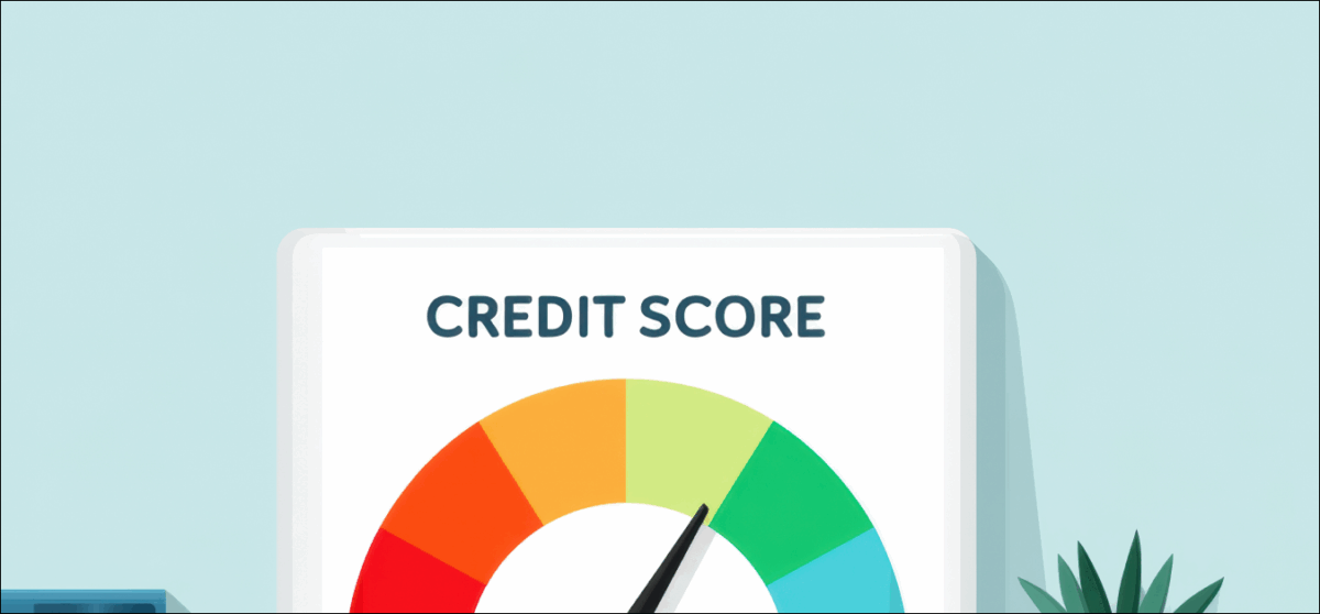 credit score gauge on a desk shows a mid-to-high rating, with books and a potted plant beside it.